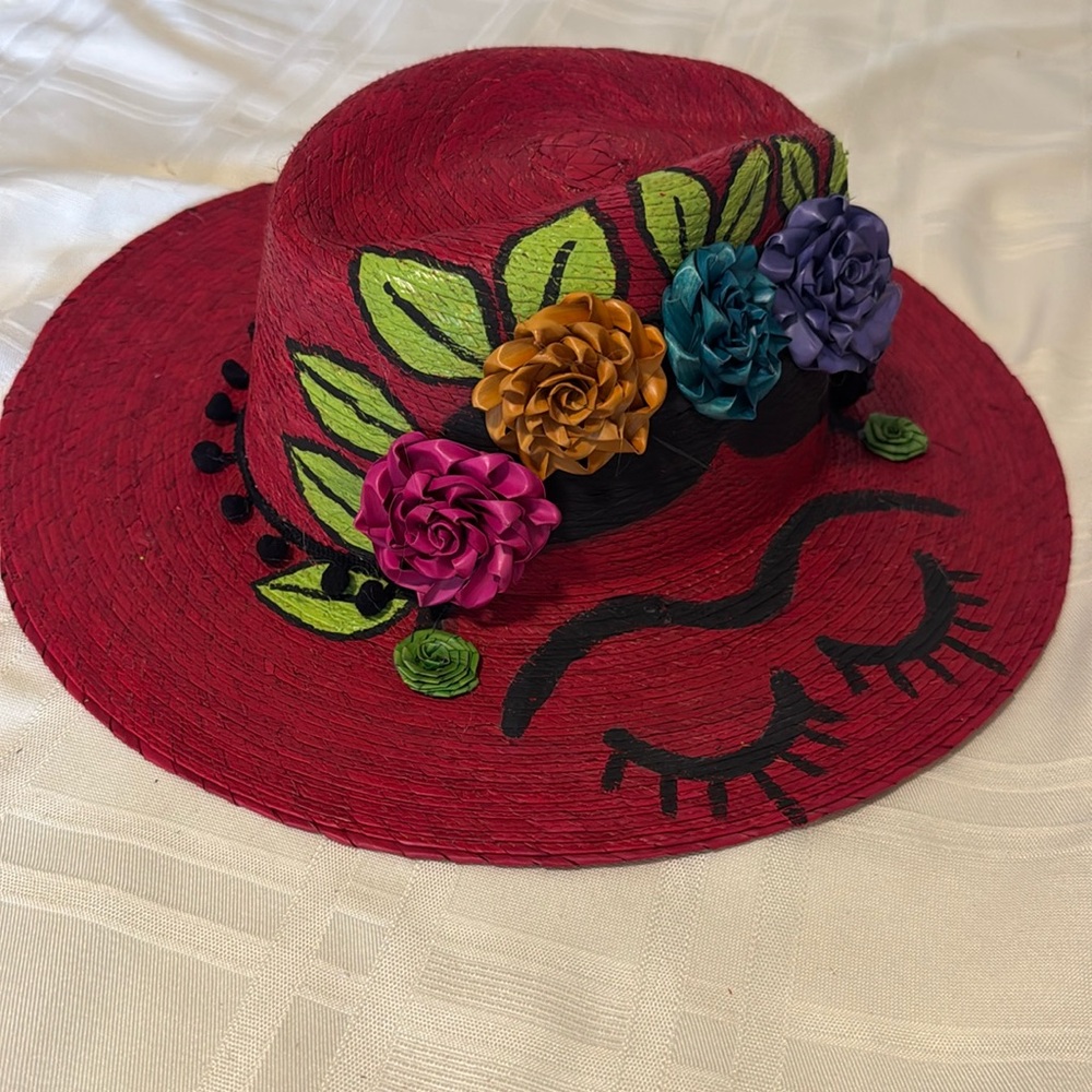 Artist signed Red Frida hat 7”x 8” inside dimensions.